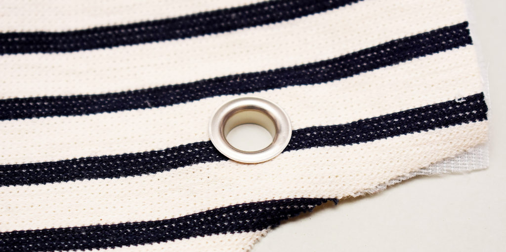 adding eyelets to fabric