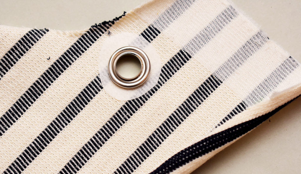 adding eyelets to fabric