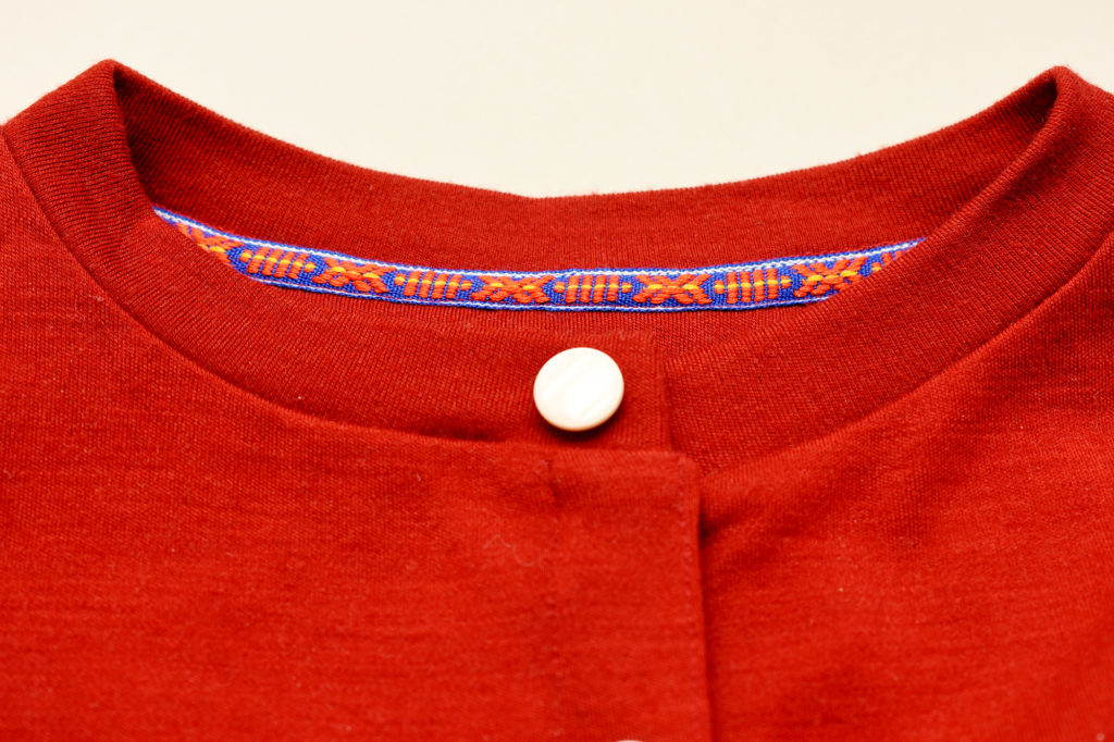 Covering a neckline seam with decorative ribbon a tutorial The Last