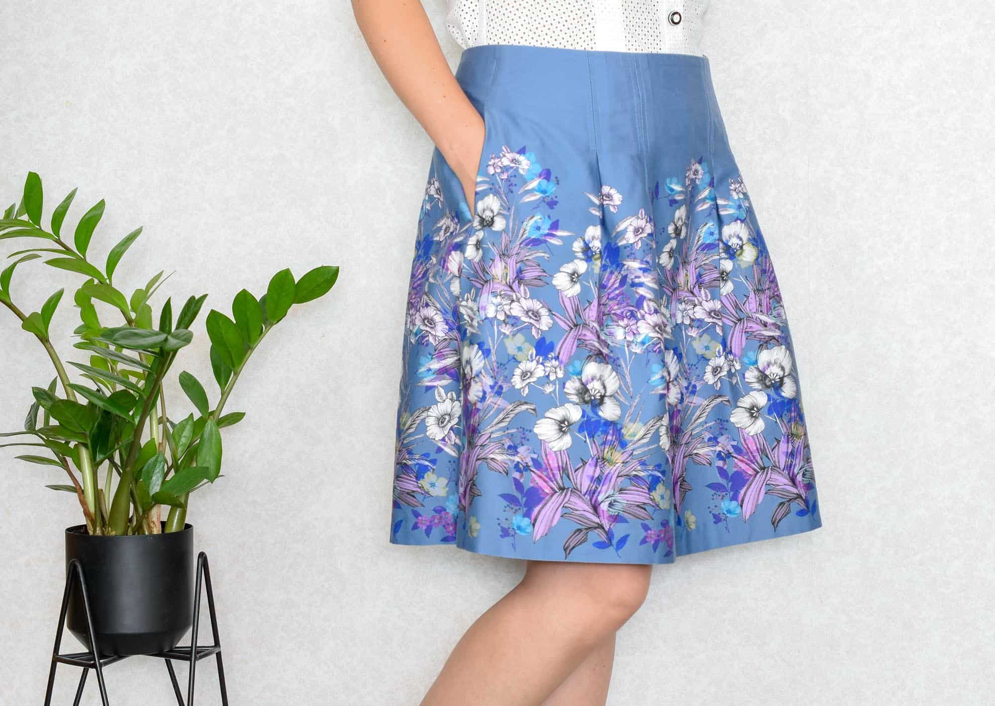 A woman in a blue skirt kicking a soccer ball photo  Skirt Image on  Unsplash