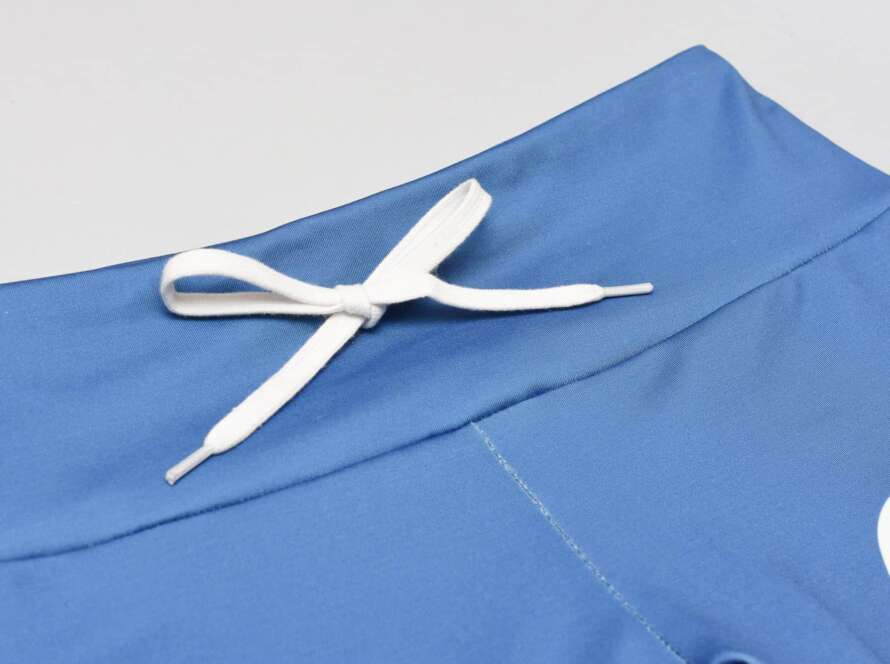 step-by-step sewing tutorial on how to add drawstrings to a leggings waistband